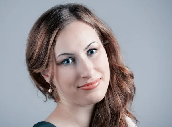 Joven mujer sonriendo — Foto de Stock