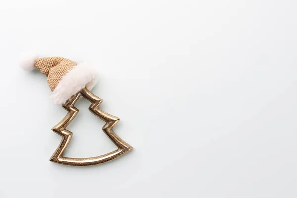 クリスマススターとサンタの帽子 パステルブルーの背景の装飾 — ストック写真