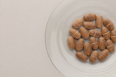 Homeopatik hap takviyesi. Alternatif tıp. Vitamin kapsülleri.