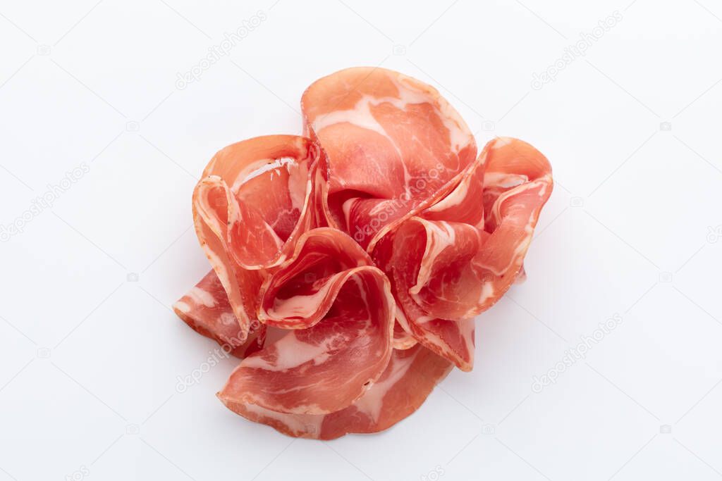 Italian prosciutto crudo. Jerked ham, isolated on white background.