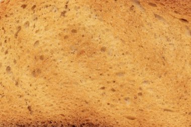 Ekmek arkaplanının yakın plan çekimi. Makro ekmek dilimi deseni.