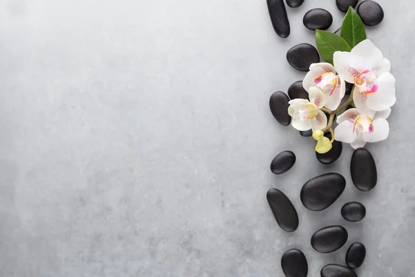 Spa Massage Stone Orchid Theme Objects Grey Background — Zdjęcie stockowe