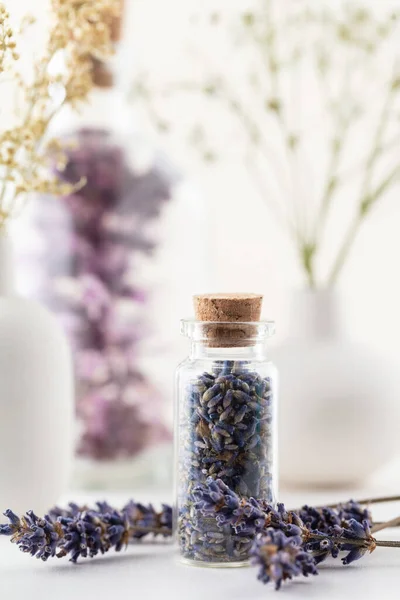 Dried lavender flowers with bottle. Natural herbs medicine. Herbal medicine. Homeopathy end alternative medicine backgrouns.