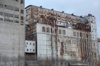 Old abandoned factory and storage buildings found at port side