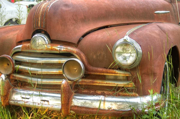 Front End Abandonned Rusty Old Car Field Royalty Free Stock Photos