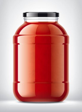 Arka planda domates suyu olan cam kavanoz.. 