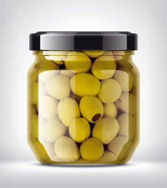 Arka planda zeytinli cam kavanoz. 