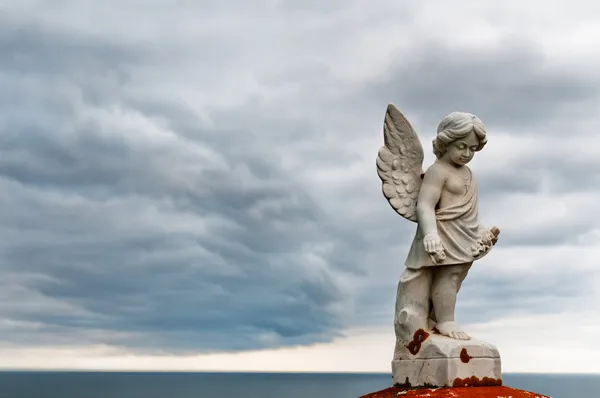 Angel under storm clouds — Stock Photo, Image
