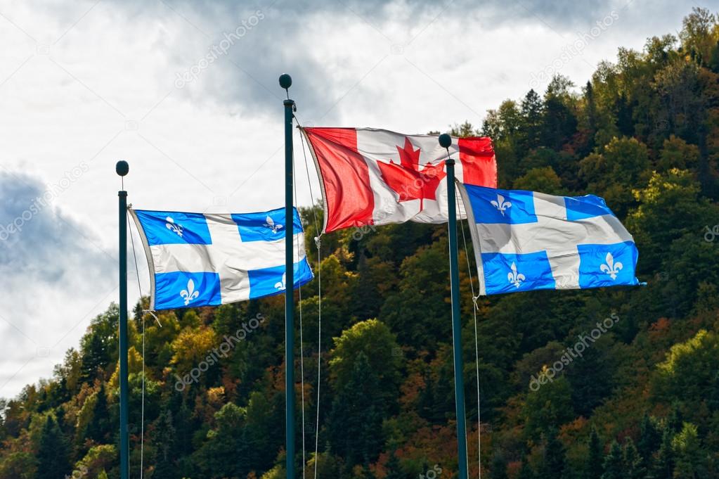 Canadian and the Quebec flag