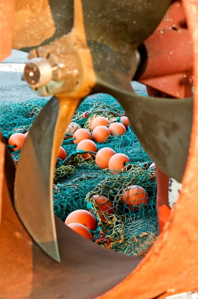 Fishing nets and propeller — Stock Photo, Image