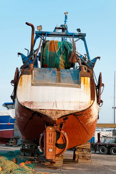 Fish trawler on land — Stock Photo, Image