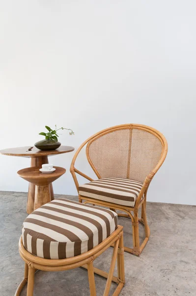 Beautiful bamboo rattan furniture in front of a white wall — Stock Photo, Image