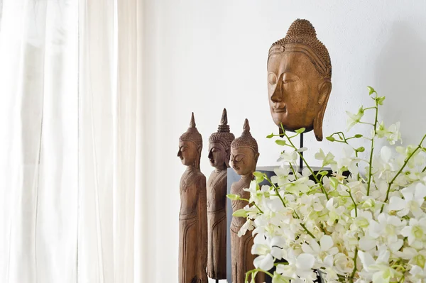 Buddha head and figurine — Stock Photo, Image