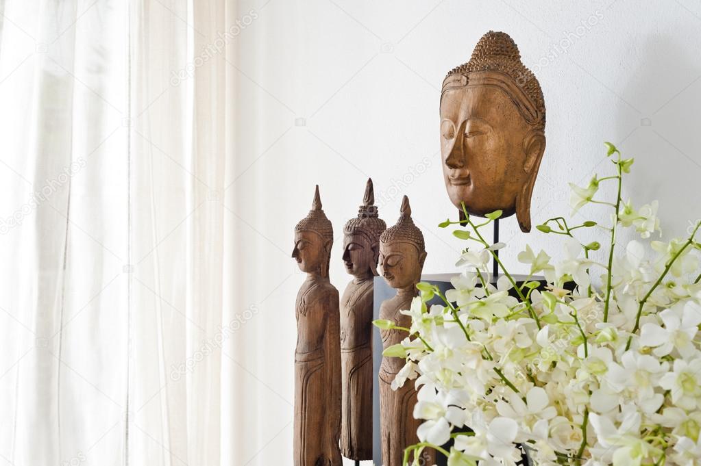 Buddha head and figurine