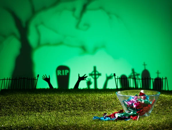 Halloween landscape with sweets — Stock Photo, Image