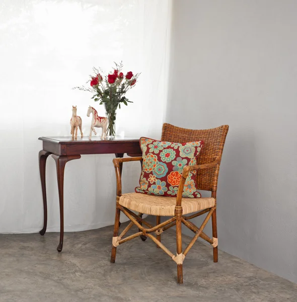 Rattan chair in a patio setting — Stock Photo, Image