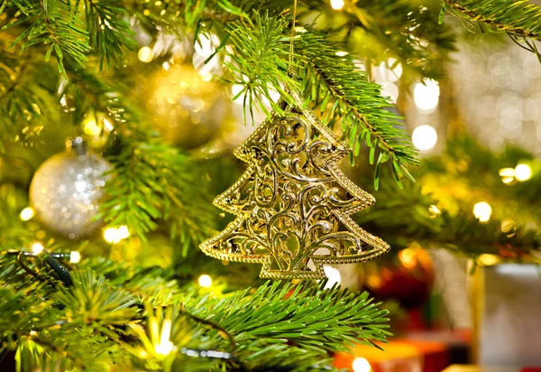 Ornament in a real Christmas tree — Stock Photo, Image