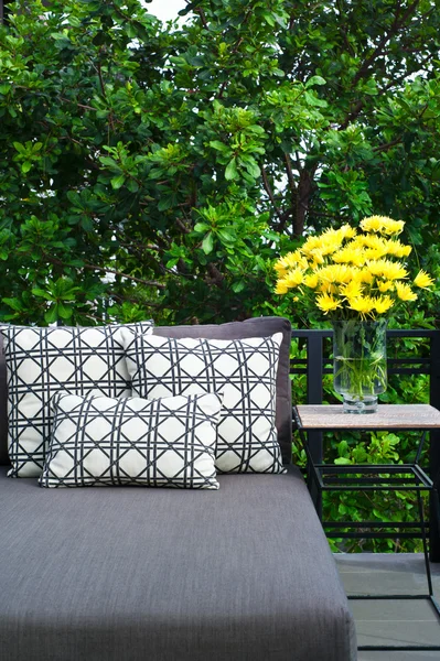 Outdoor patio seating with daybed — Stock Photo, Image