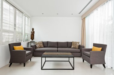 Bright Living room with grey sofa  clipart