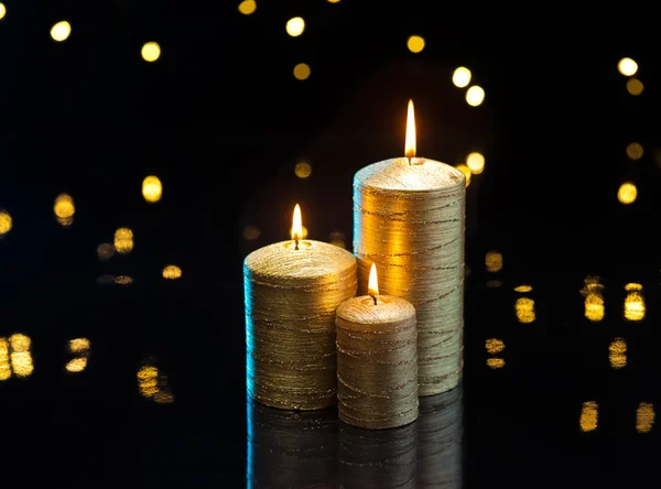 Three golden Candles — Stock Photo, Image