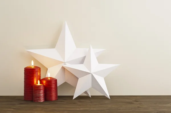 Two stars with red candles — Stock Photo, Image