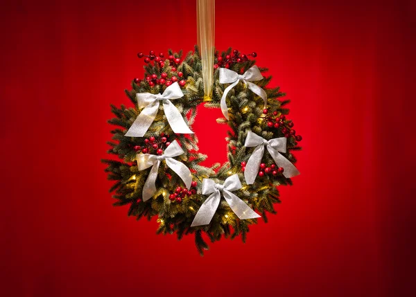 Advent wreath over red background — Stock Photo, Image