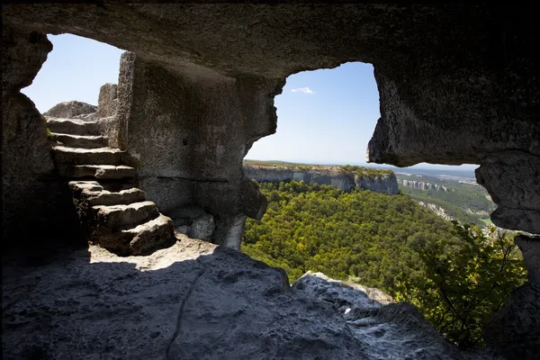 Lookout from the cave and stairs inside — Stock Photo, Image