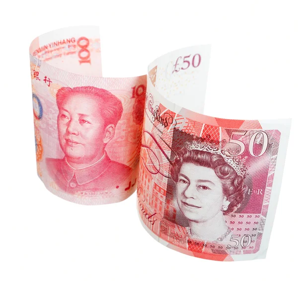 Britse curreny en chinese munt — Stockfoto