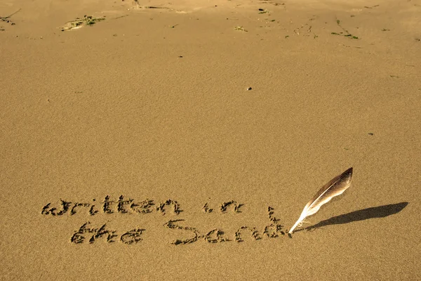 C'est écrit dans le sable — Photo