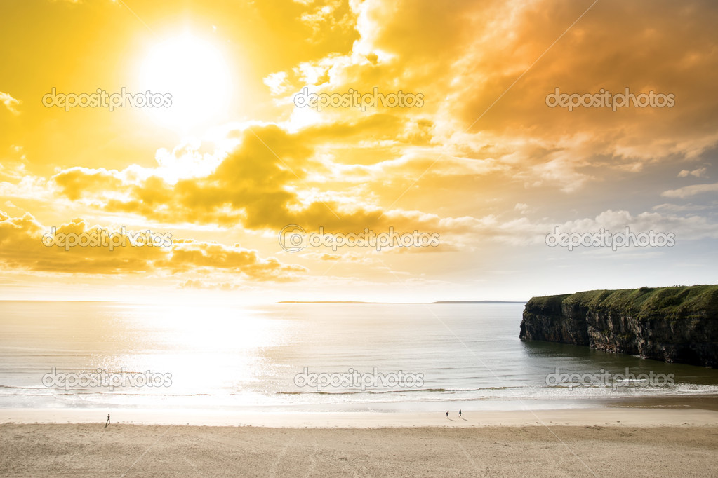 tourists walking the Ballybunion beach and cliff