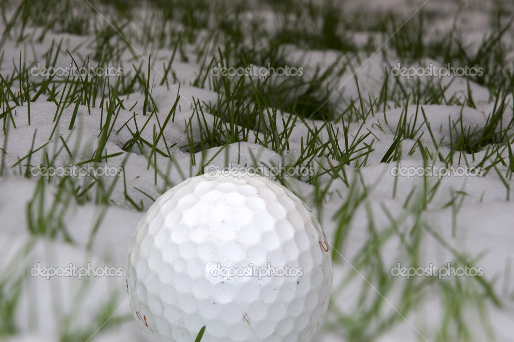 single golf ball in the snow — Stock Photo © morrbyte 37223721