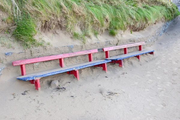 Ballybunion bench covered in sand — Stock Photo, Image