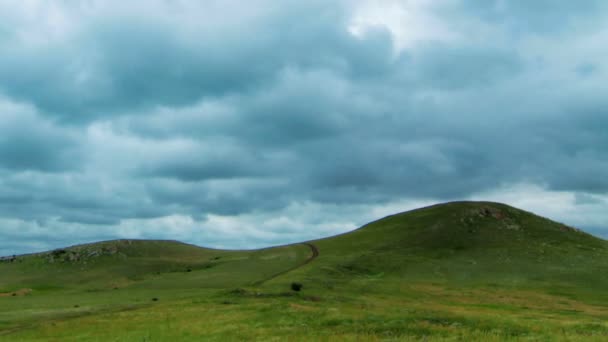 Hills under cloudy sky — Stock Video