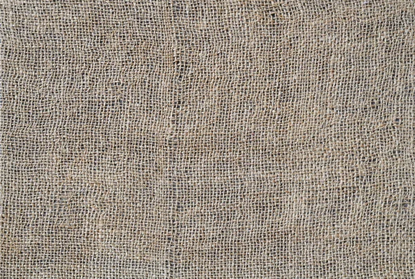 Soyut bir arkaplan olarak kaba bir çuval bezi parçası