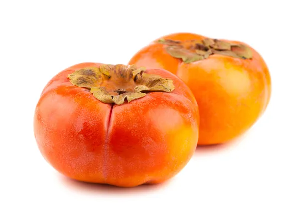 Two persimmon fruits on white background — Stock Photo, Image