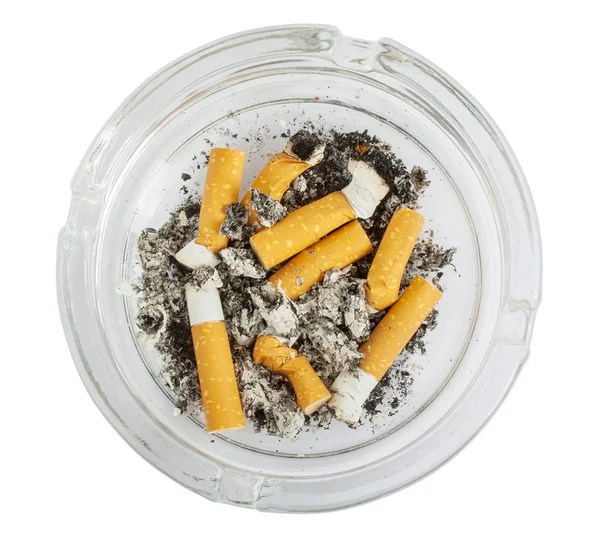 Stubs in glass ashtray top view — Stock Photo, Image