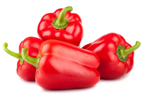 Four red sweet peppers — Stock Photo, Image