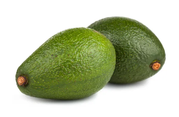Два зелёных авокадо — стоковое фото