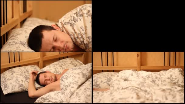 Man sover i sin säng — Stockvideo