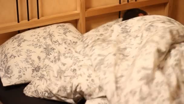 Man sleeping in his bed — Stock Video