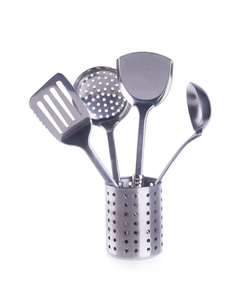 Kuchyňské potřeby. kuchyňské utensilson na pozadí — Stock fotografie
