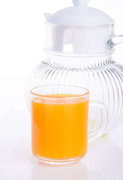 Orangensaft auf einem Hintergrund — Stockfoto