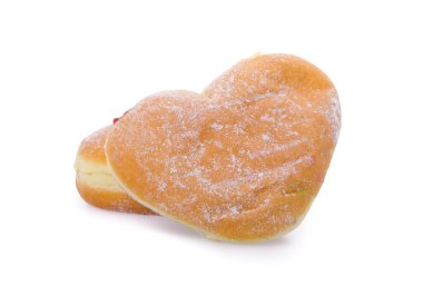 çörek, kalp şeklinde pasta arka plan üzerinde