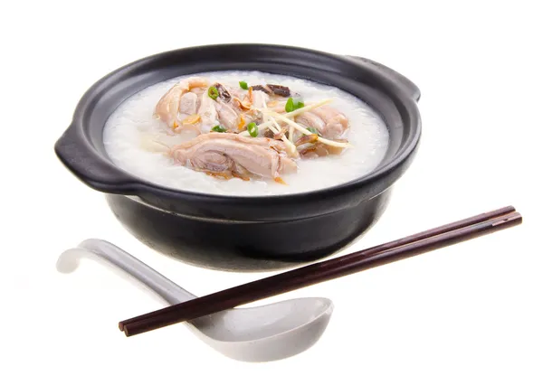 Traditional chinese porridge rice gruel served in claypot — Stock Photo, Image