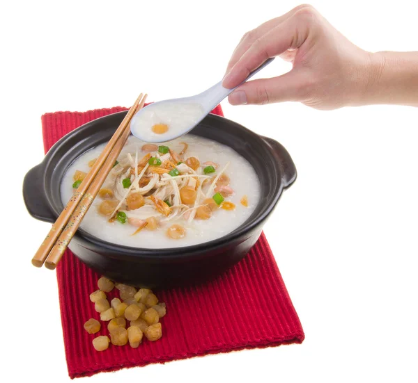 Traditional chinese scallop porridge rice gruel served in claypo — Stock Photo, Image