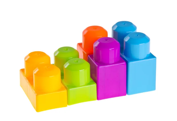 Plastic building blocks on background — Stock Photo, Image