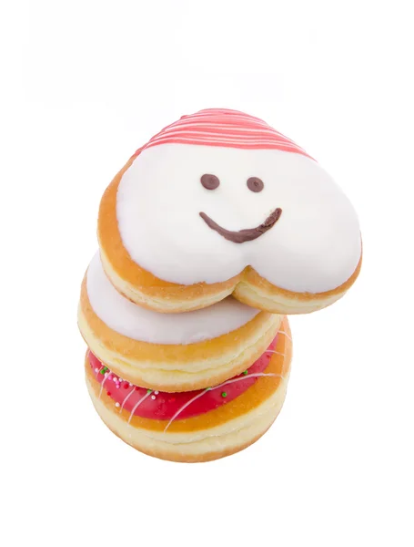 Donut, herzförmiges Gebäck auf Hintergrund — Stockfoto