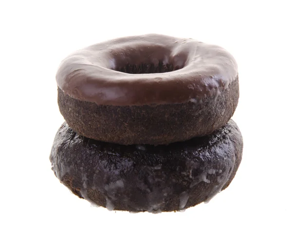 Donuts de chocolate em um contexto — Fotografia de Stock