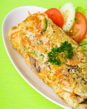 Deniz ürünleri ve mantarlı omlet