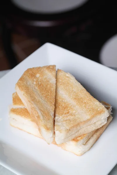 Withe Brotscheiben Toasts auf Hintergrund — Stockfoto